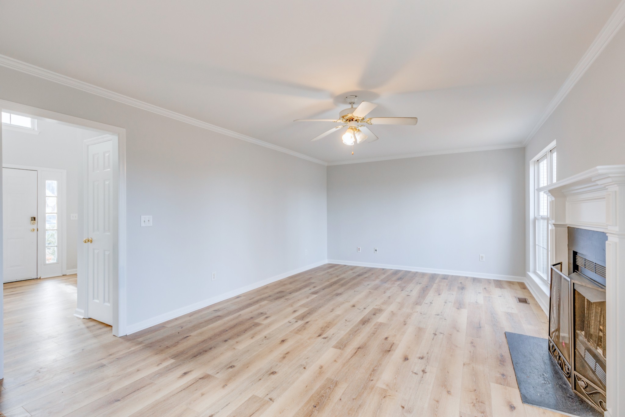 2829 Rader Ridge Court Antioch, TN 37013 - Photo 14 of 35 an empty room with wooden floor and ceiling fan