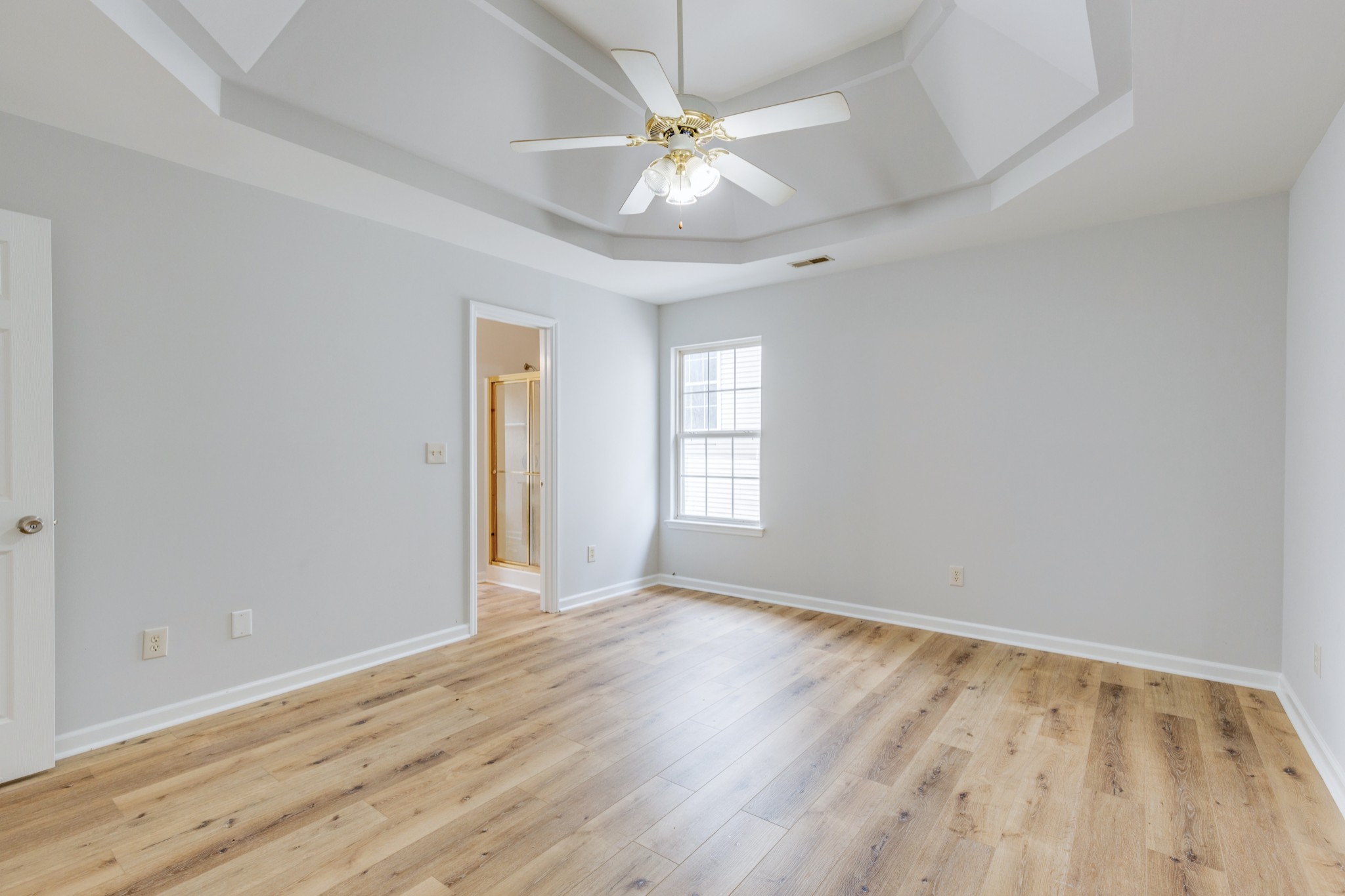 2829 Rader Ridge Court Antioch, TN 37013 - Photo 19 of 35 wooden floor in an empty room with a window