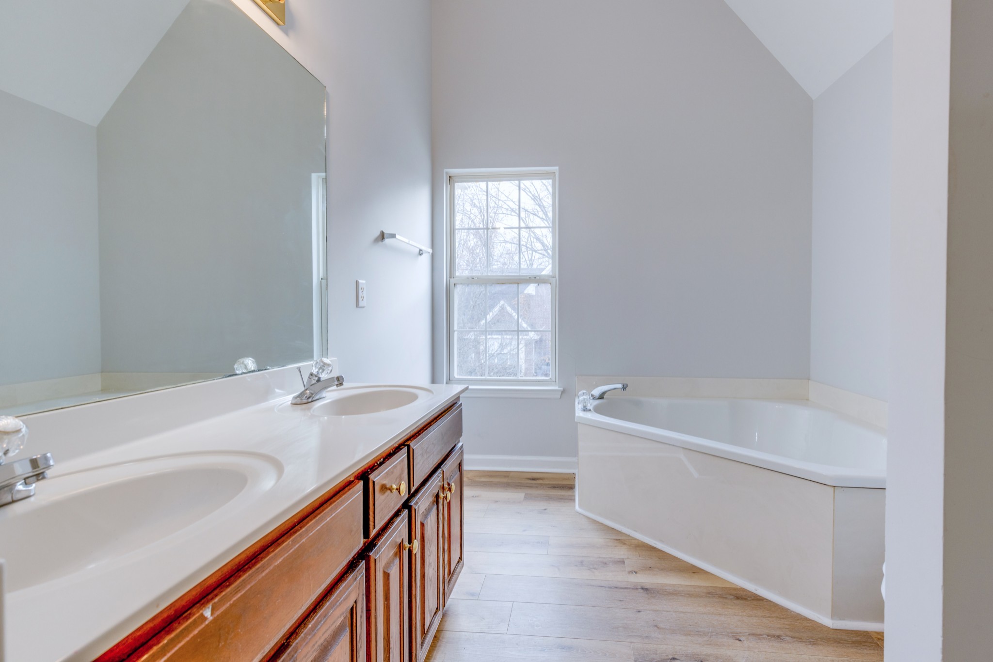 2829 Rader Ridge Court Antioch, TN 37013 - Photo 21 of 35 a bathroom with a tub sink and mirror