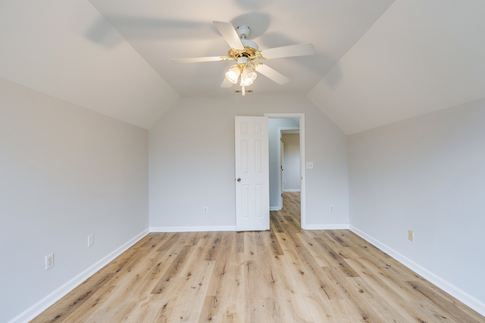 2829 Rader Ridge Court Antioch, TN 37013 - Photo 29 of 35 a view of a room with wooden floor and a ceiling fan