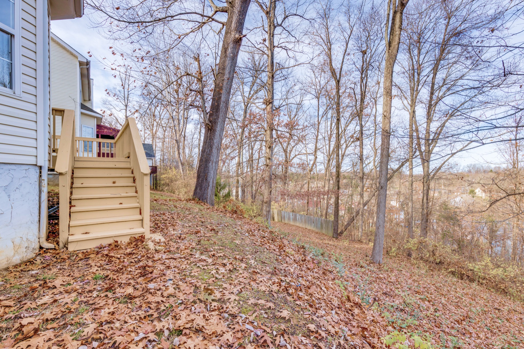 2829 Rader Ridge Court Antioch, TN 37013 - Photo 34 of 35 a backyard of a house with lots of green space