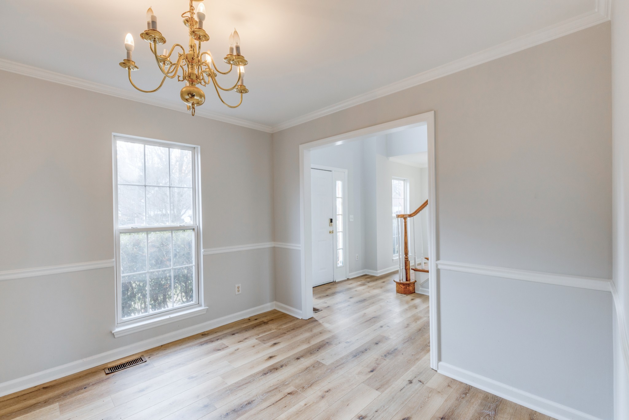 2829 Rader Ridge Court Antioch, TN 37013 - Photo 5 of 35 wooden floor in an empty room with a window