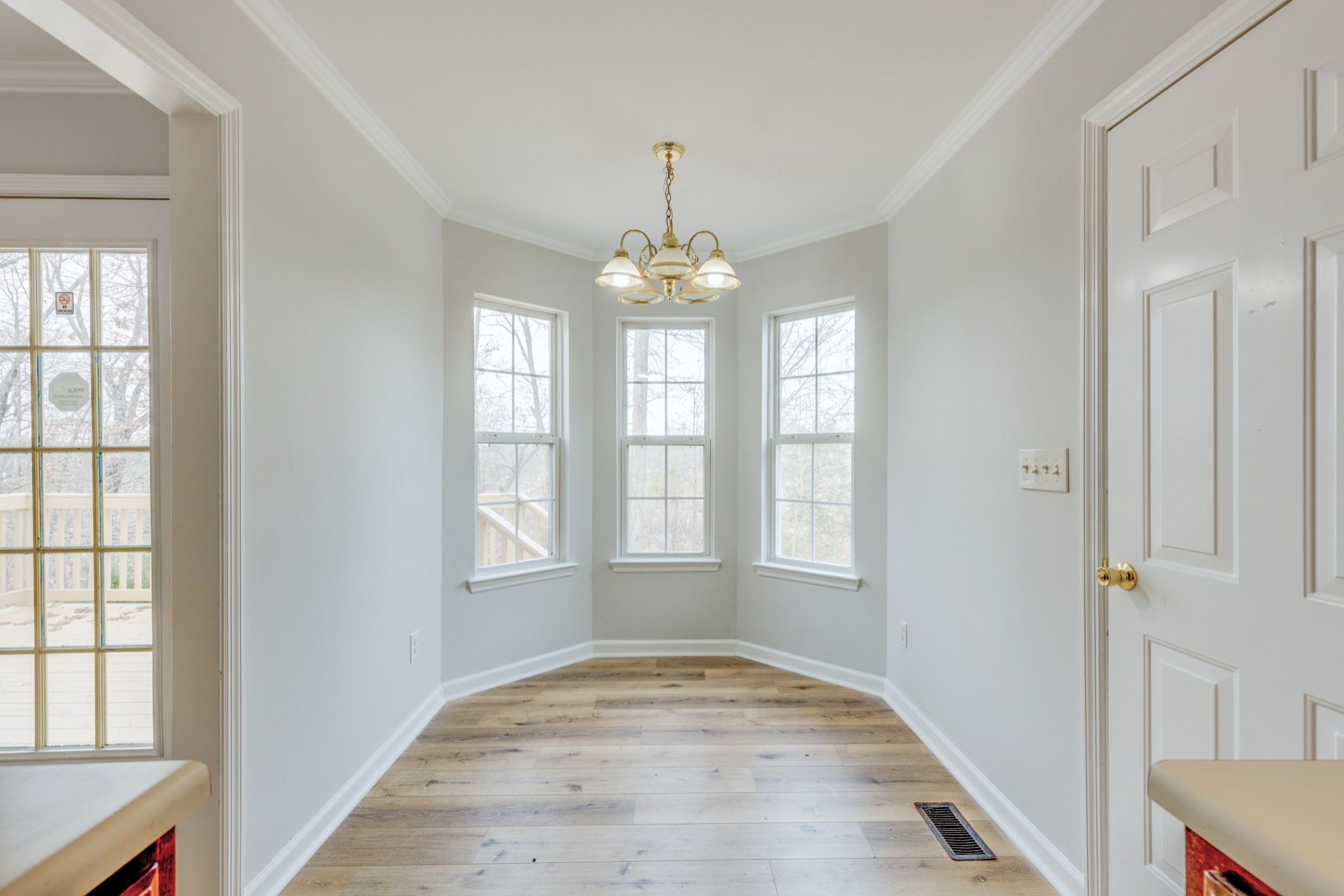 2829 Rader Ridge Court Antioch, TN 37013 - Photo 10 of 35 wooden floor in an empty room with a window