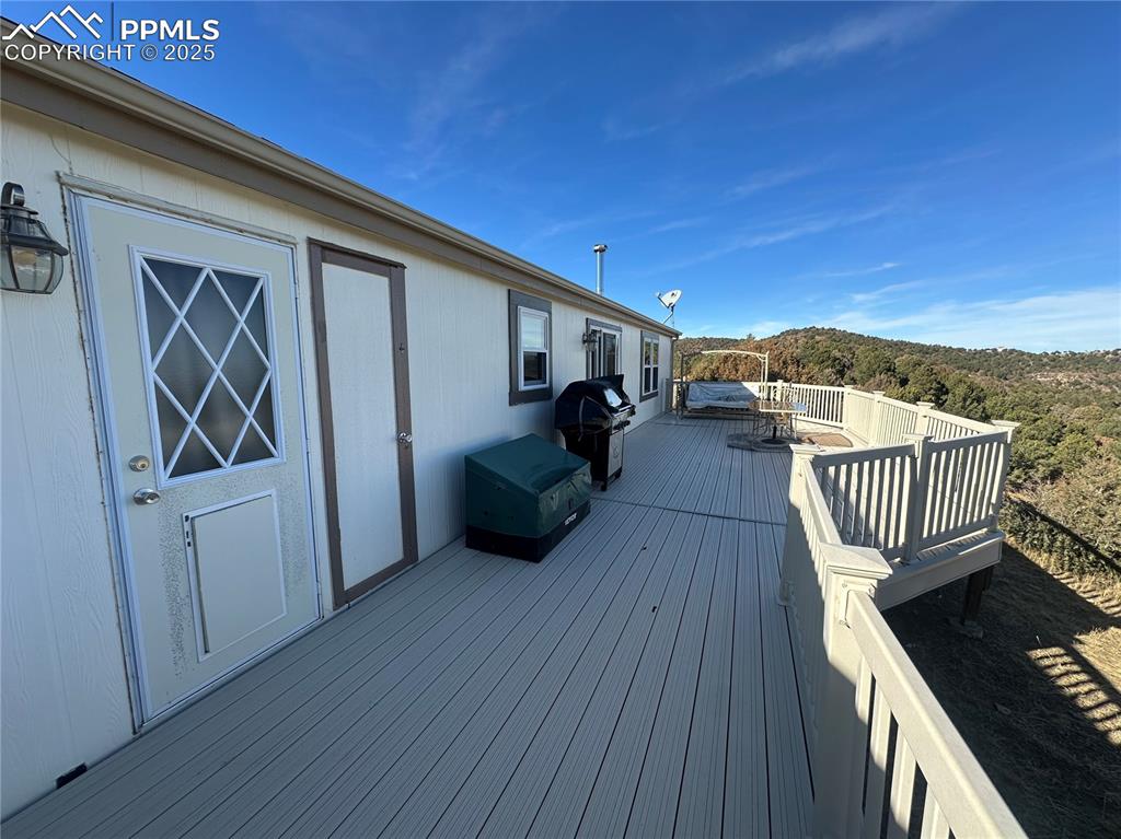 33171 Elk Park Road Trinidad, CO 81082 - Photo 10 of 21 a view of a balcony with furniture and wooden floor