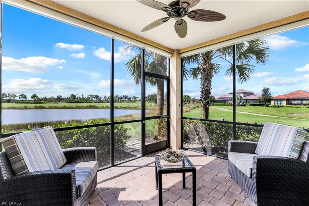 8776 Bellano Court, Unit 104 Naples, FL 34119 - Photo 18 of 34 a view of a chair and tables in the balcony
