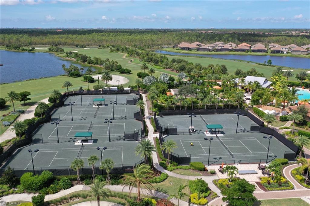 8776 Bellano Court, Unit 104 Naples, FL 34119 - Photo 28 of 34 an aerial view of multiple house