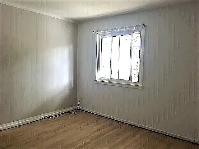 an empty room with a window