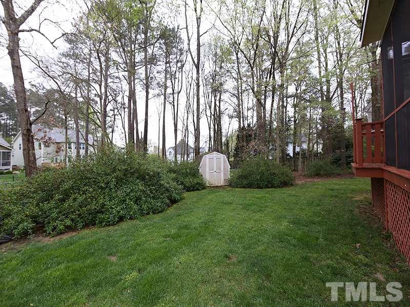 2108 Osprey Circle Raleigh, NC 27615 - Photo 14 of 15 a view of a garden with large trees
