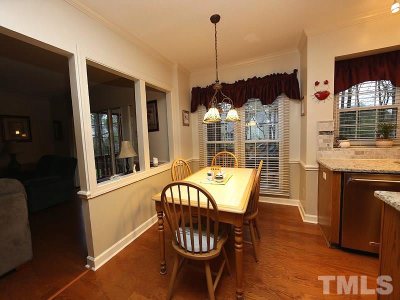 2108 Osprey Circle Raleigh, NC 27615 - Photo 5 of 15 a view of a dining room with furniture window and outside view