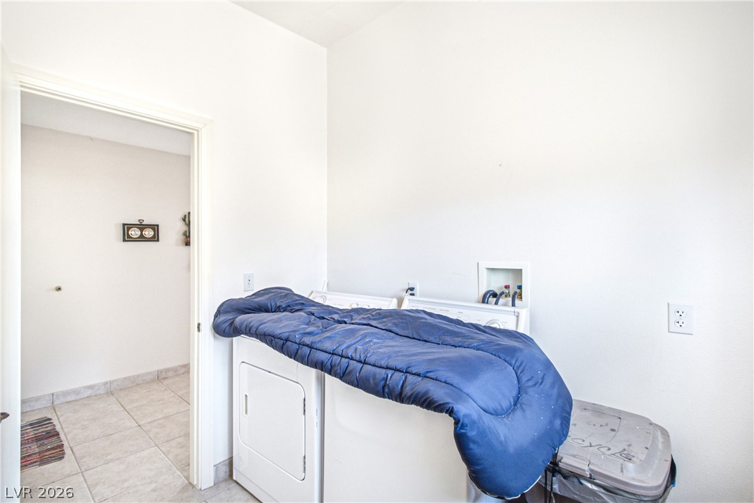 Rocking S Ranch Road Searchlight, NV 89046 - Photo 33 of 47 A well-appointed laundry area offers a dedicated space for household chores.