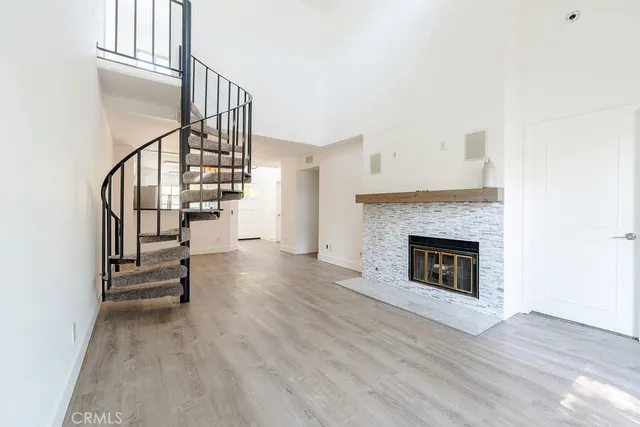an empty room with sliding glass door