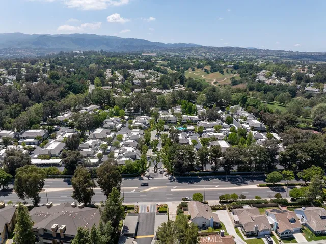 an aerial view of residential house and outdoor space