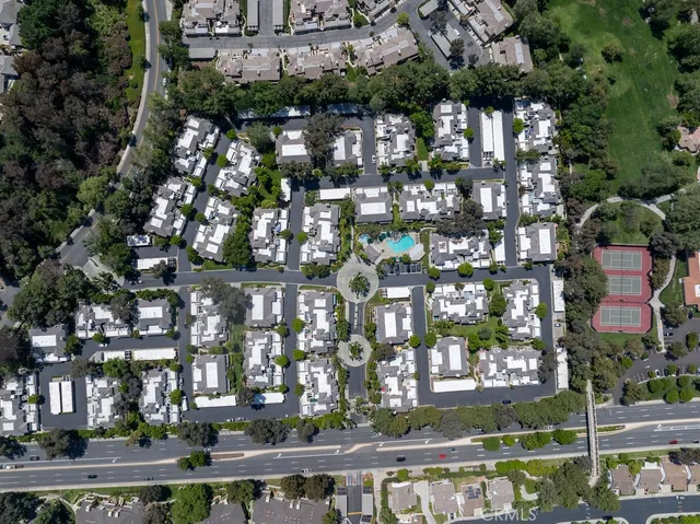 an aerial view of a house with a garden