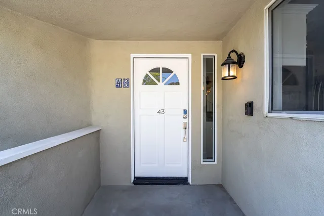 a view of roof deck with a barbeque grill and a forest