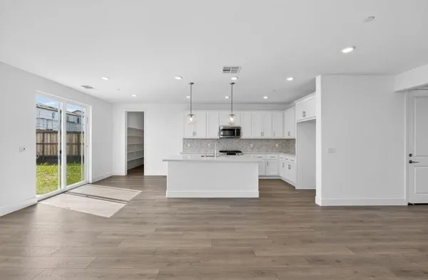 a bathroom with a double vanity sink and mirror