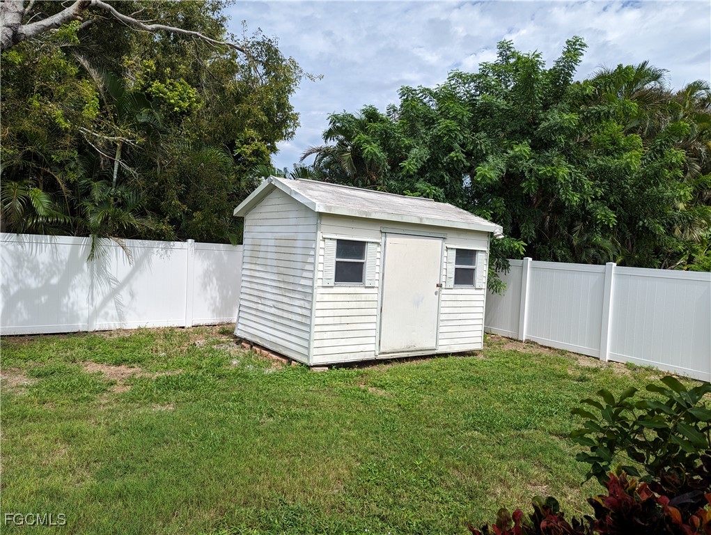 2311 Southwest 16th Terrace Cape Coral, FL 33991 - Photo 4 of 23 a view of a house with a yard