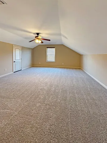 a view of an empty room and a yard