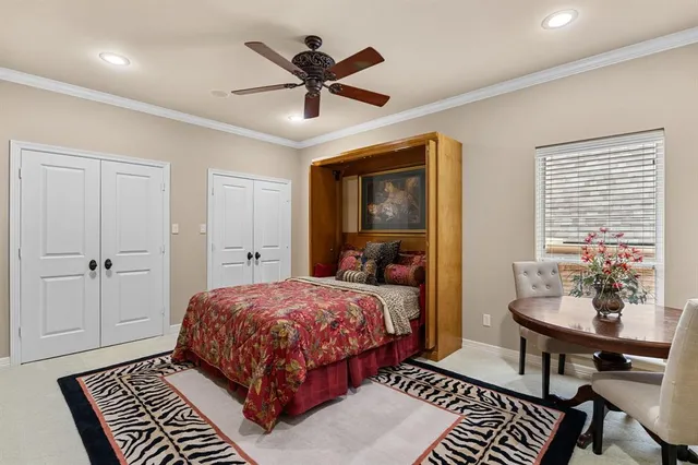 a bathroom with a granite countertop sink toilet and a mirror