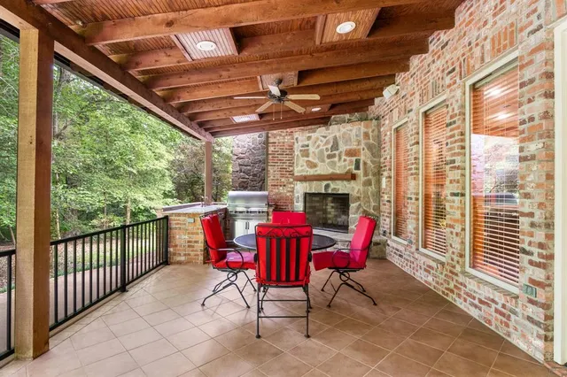 a open kitchen with a stove and a refrigerator