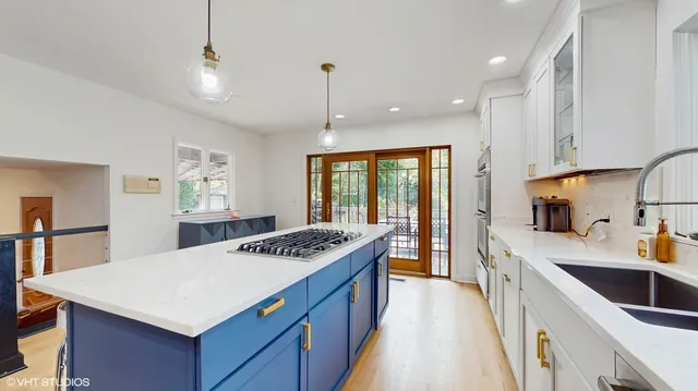 a kitchen that has a cabinets and a stove