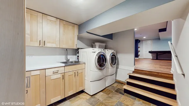 a utility room with dryer and washer
