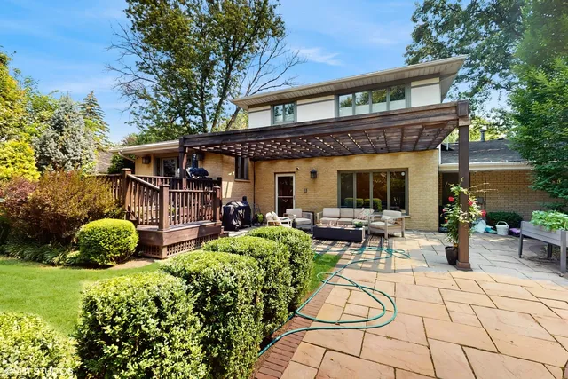 a view of house with patio outdoor seating and entertaining space