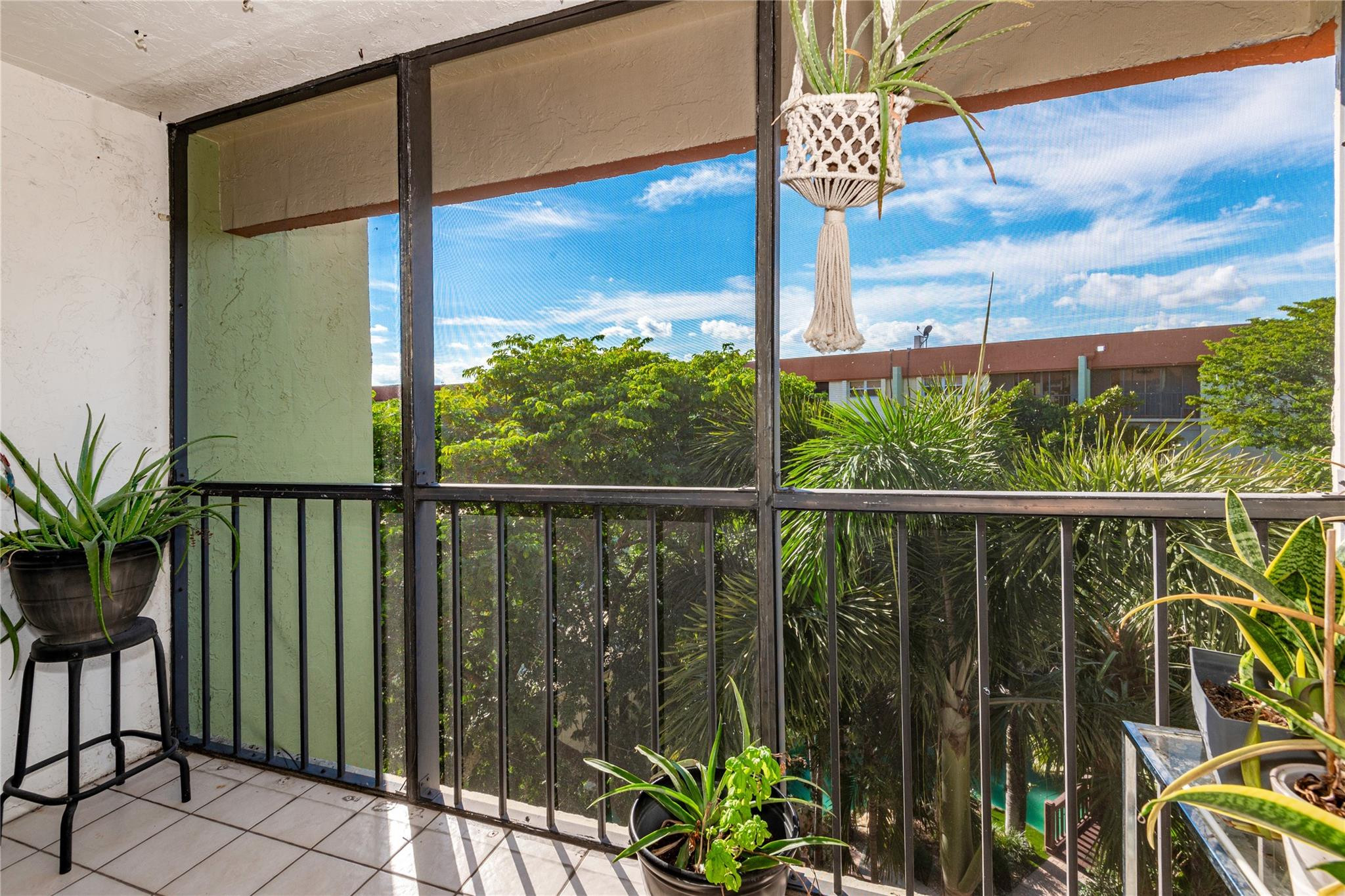 5300 Northeast 24th Terrace, Unit 512 Fort Lauderdale, FL 33308 - Photo 20 of 35 a view of a balcony with chairs
