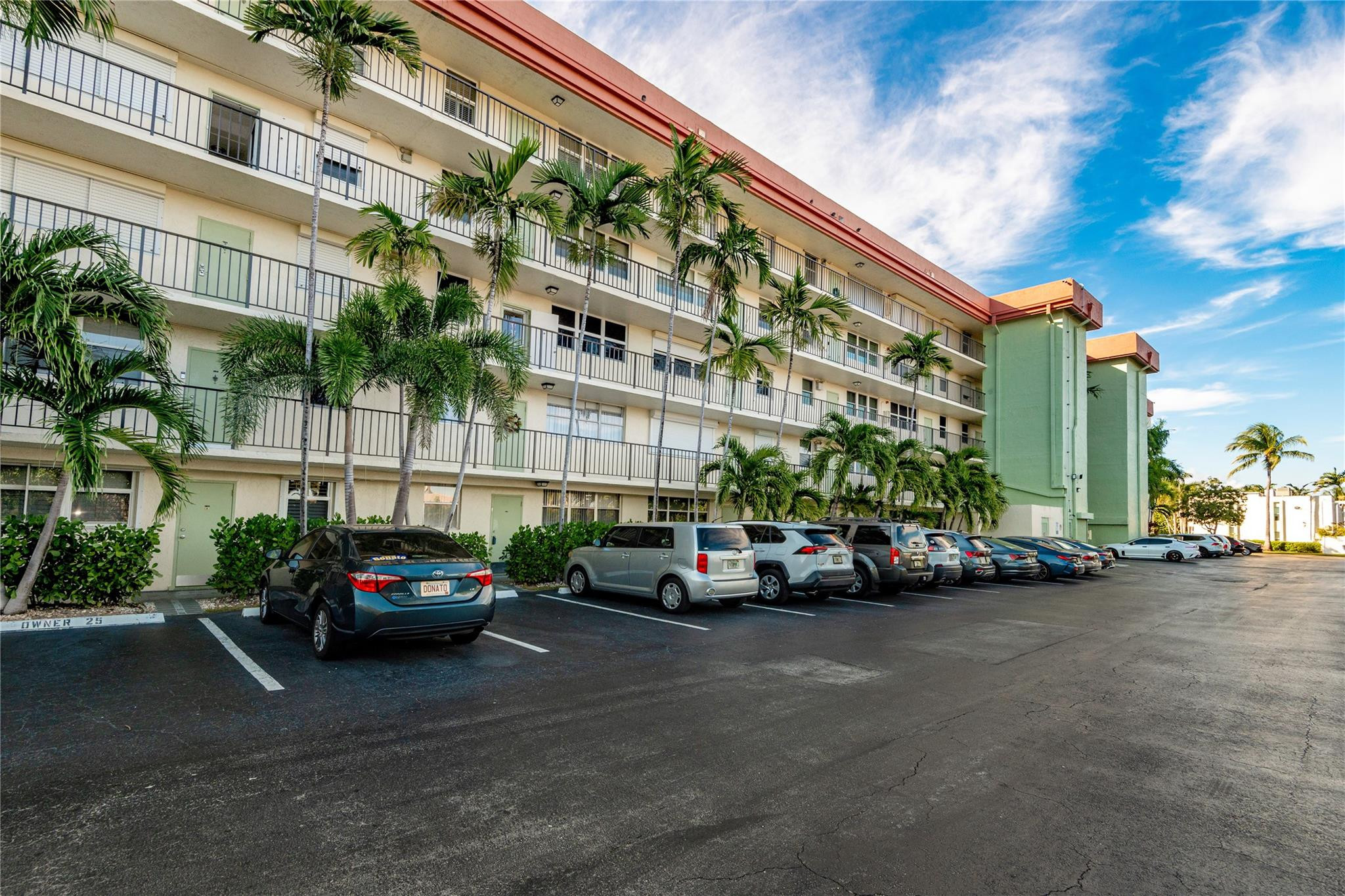 5300 Northeast 24th Terrace, Unit 512 Fort Lauderdale, FL 33308 - Photo 25 of 35 a car parked in front of a building