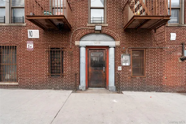 a front view of a house with a door
