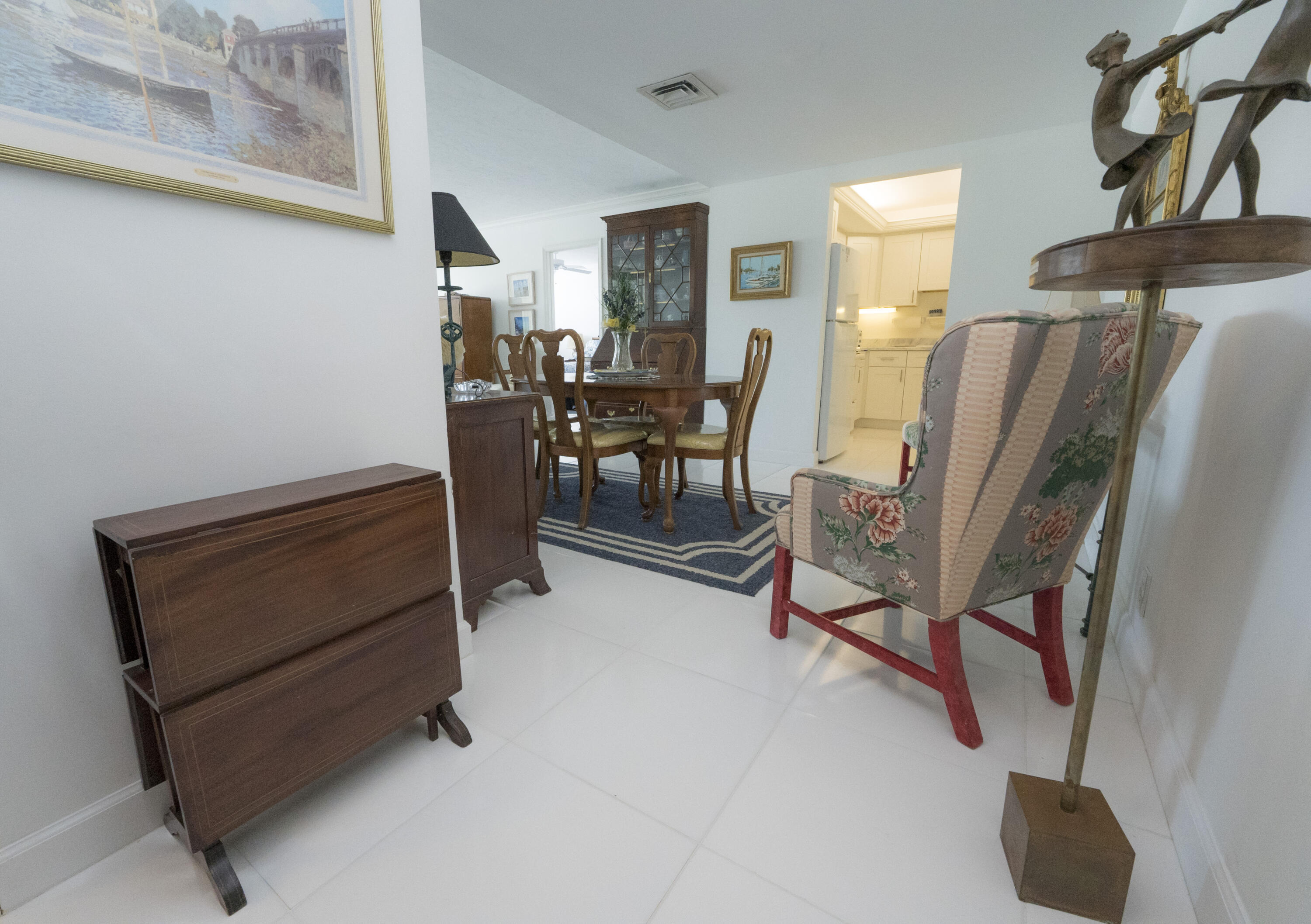 336 Golfview Road, Unit 203 North Palm Beach, FL 33408 - Photo 7 of 43 Foyer to Dining