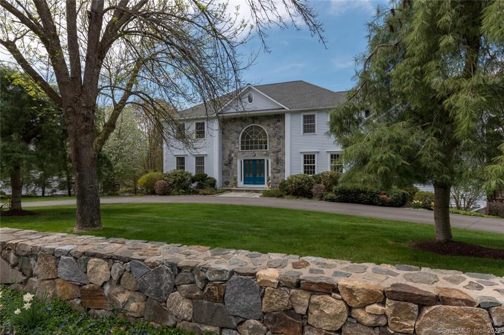 21 May Court Monroe, CT 06468 - Photo 1 of 1 a front view of a house with a yard