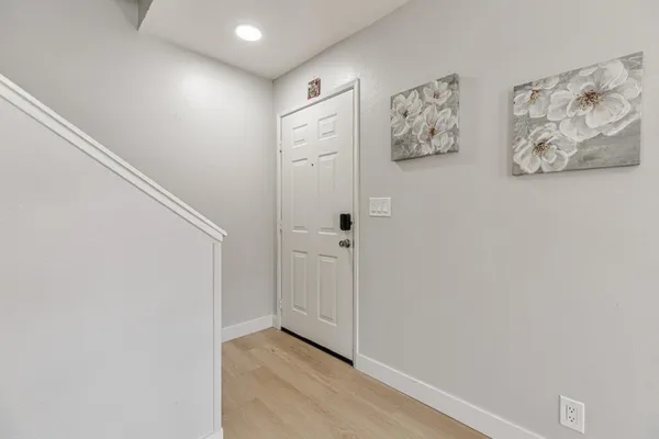 a view of wall with hallway