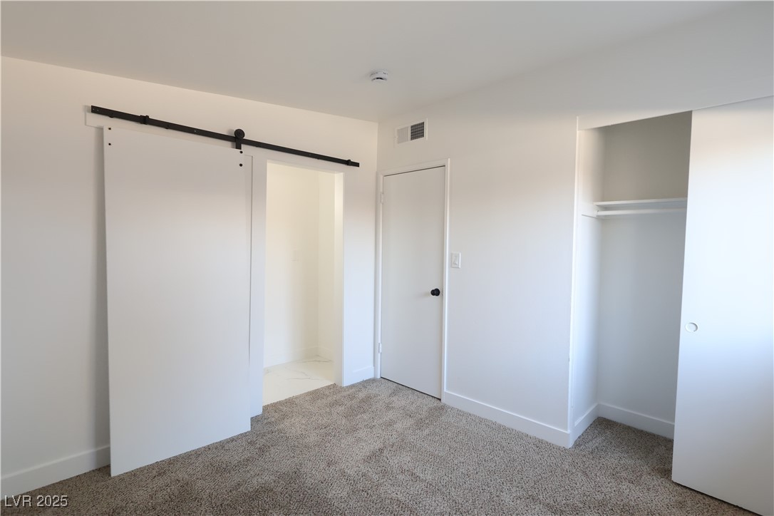 3115 Wright Avenue North Las Vegas, NV 89030 - Photo 11 of 20 Unfurnished bedroom featuring visible vents, a clo
