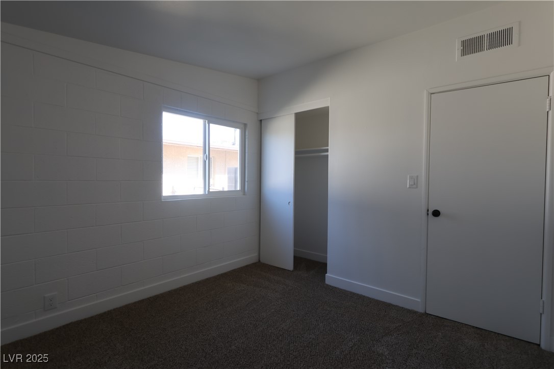 3115 Wright Avenue North Las Vegas, NV 89030 - Photo 14 of 20 Unfurnished bedroom featuring baseboards, visible