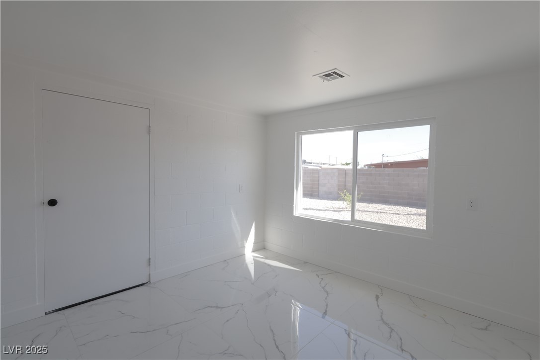 3115 Wright Avenue North Las Vegas, NV 89030 - Photo 15 of 20 Unfurnished room featuring marble finish floor and