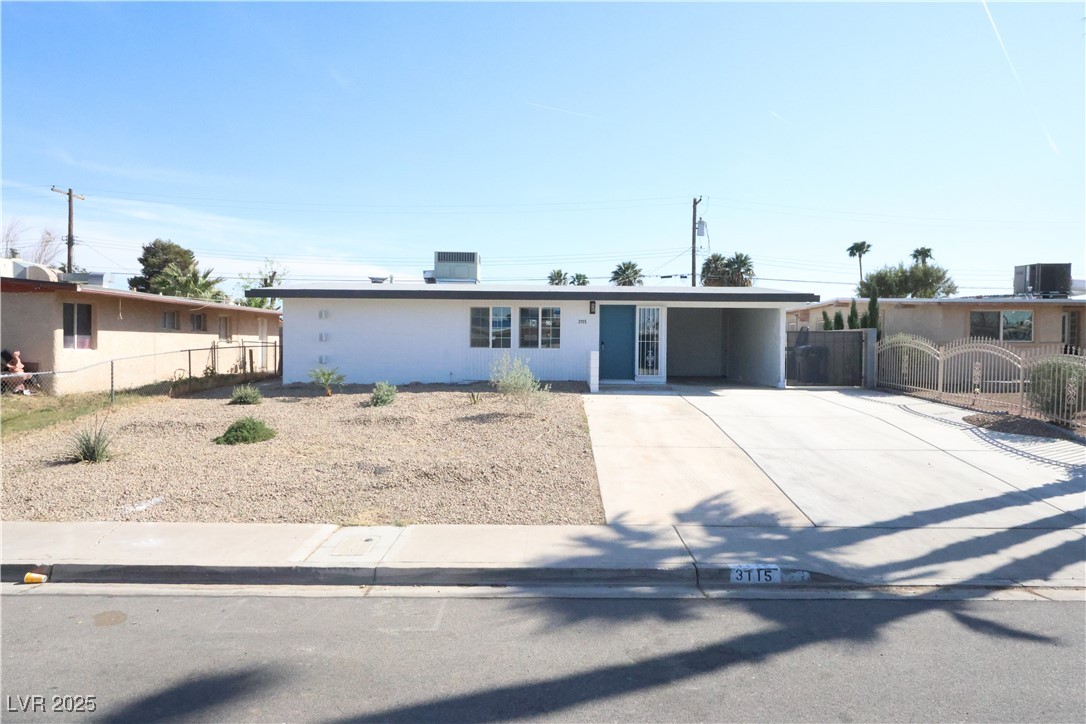 3115 Wright Avenue North Las Vegas, NV 89030 - Photo 20 of 20 View of front of home with concrete driveway, a ca