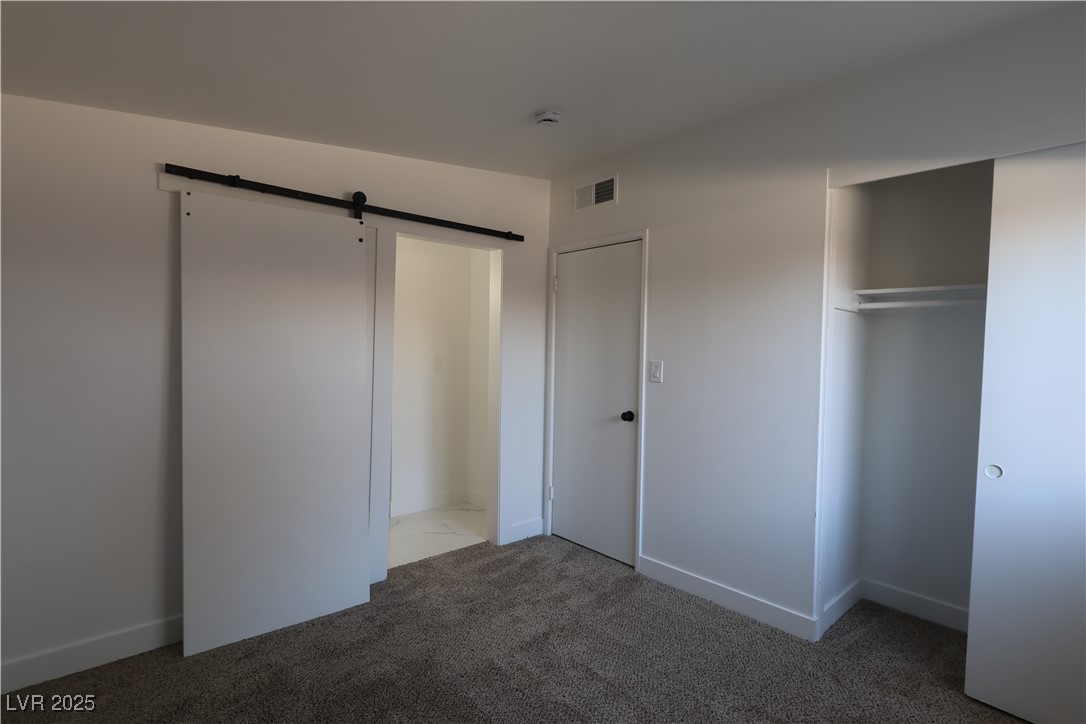 3115 Wright Avenue North Las Vegas, NV 89030 - Photo 7 of 20 Unfurnished bedroom featuring a closet, carpet flo