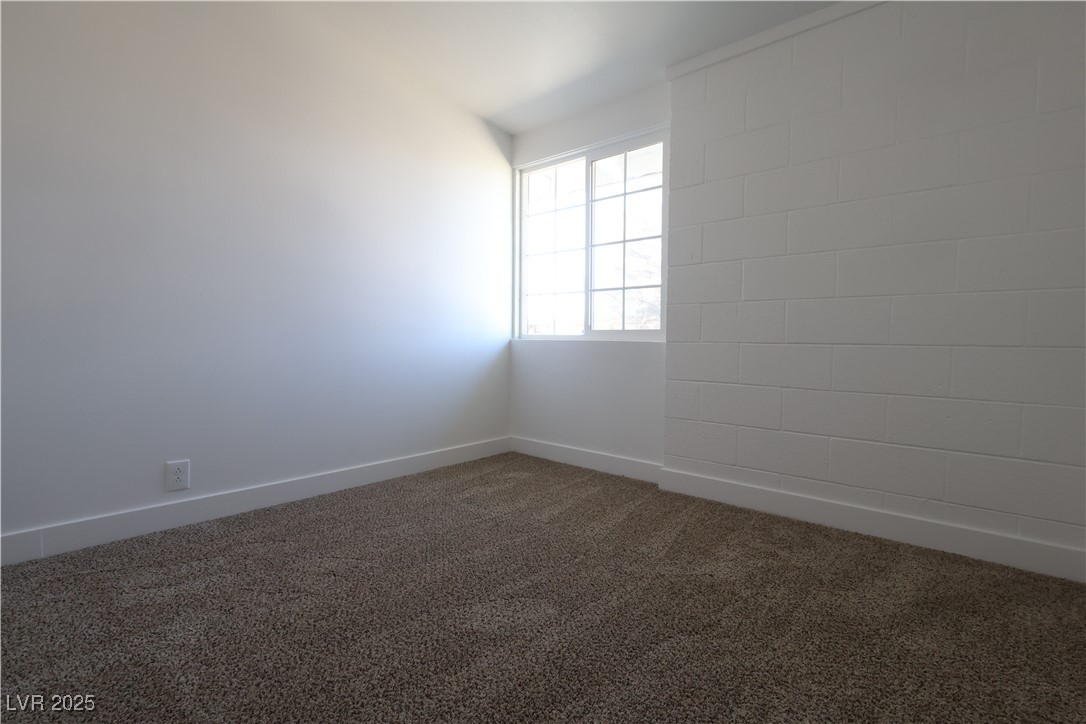 3115 Wright Avenue North Las Vegas, NV 89030 - Photo 9 of 20 Unfurnished room with baseboards and carpet