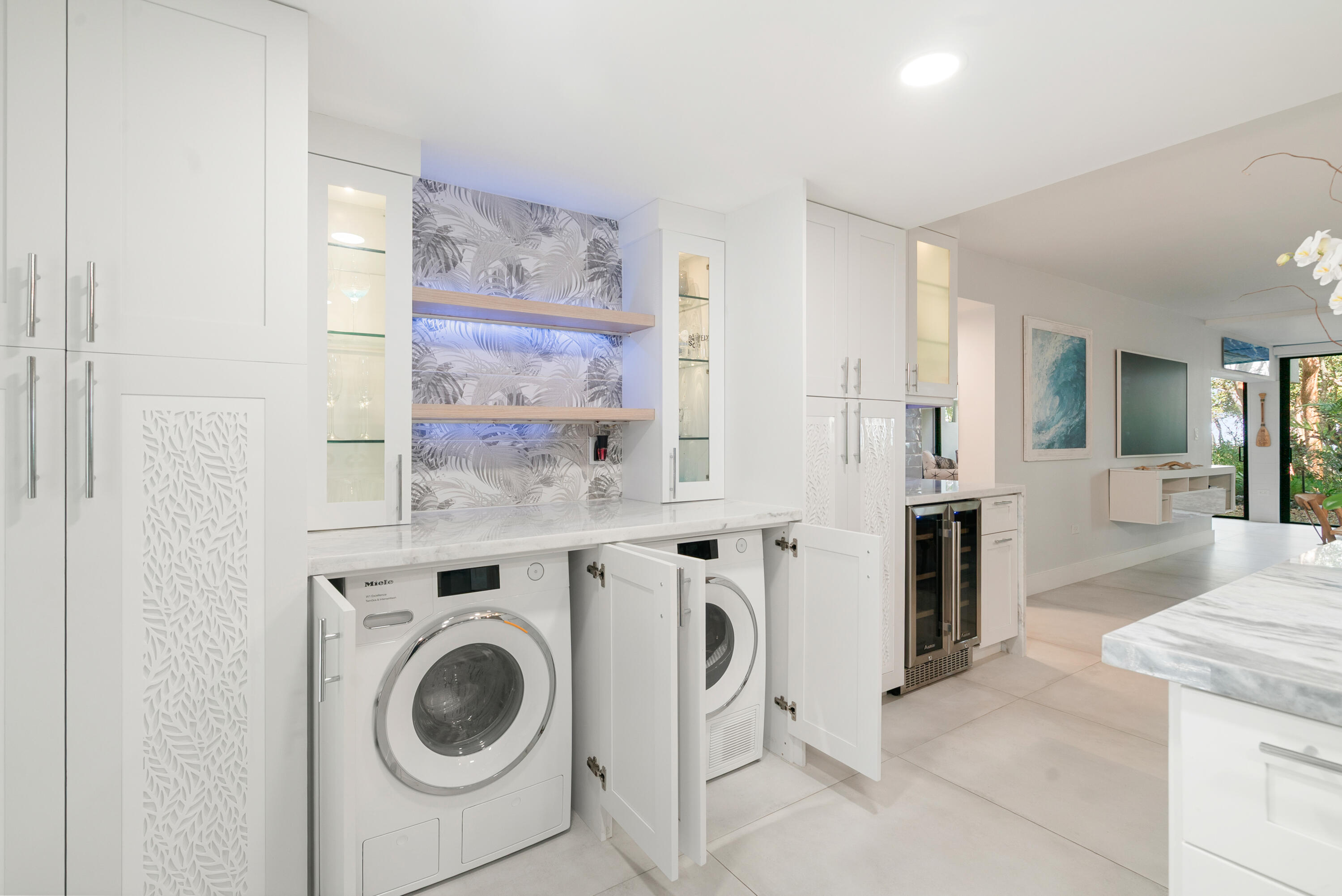 97652 Overseas Highway, Unit M4 Key Largo, FL 33037 - Photo 13 of 44 a view of a kitchen with refrigerator and stove