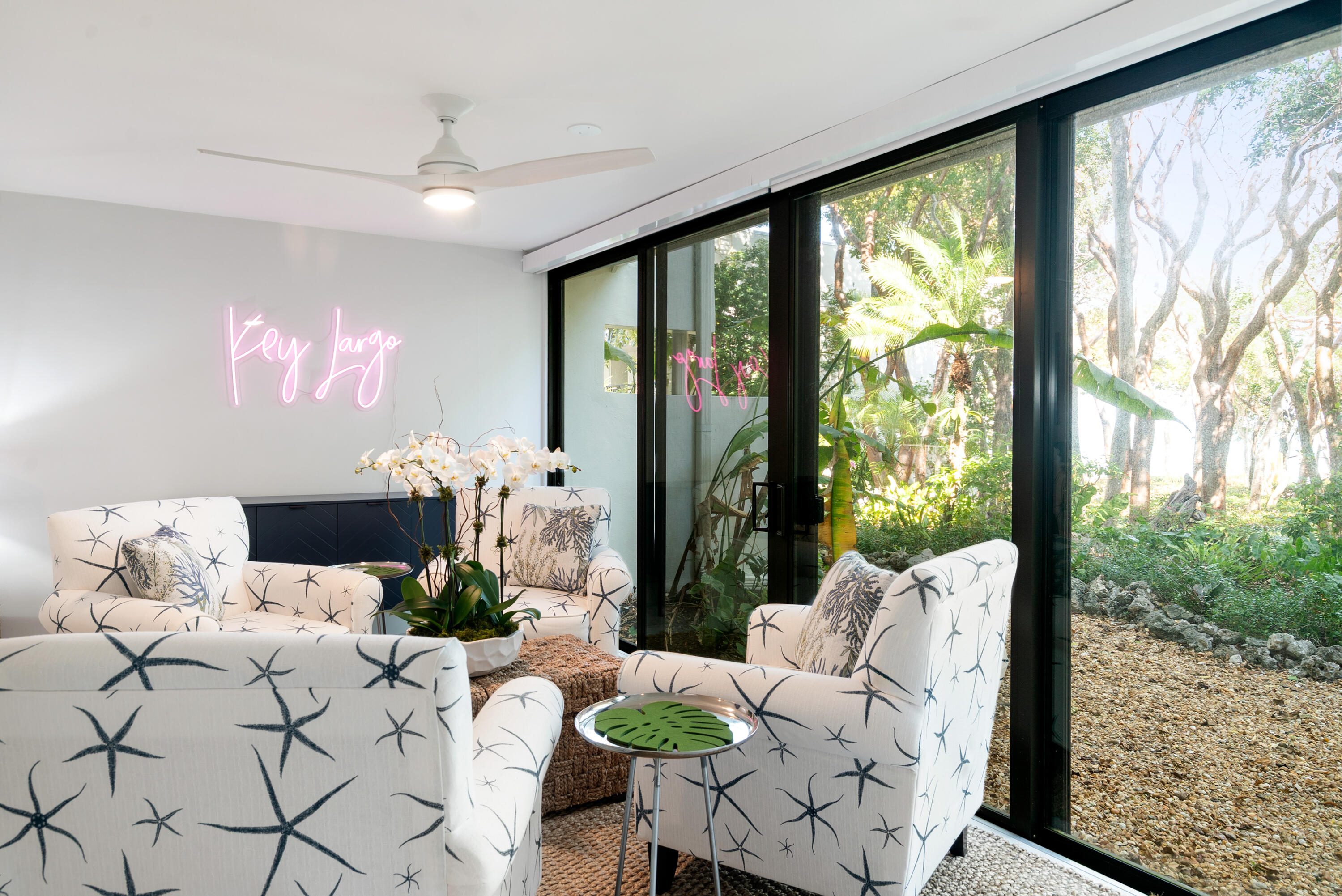 97652 Overseas Highway, Unit M4 Key Largo, FL 33037 - Photo 16 of 44 a living room with furniture and a large window