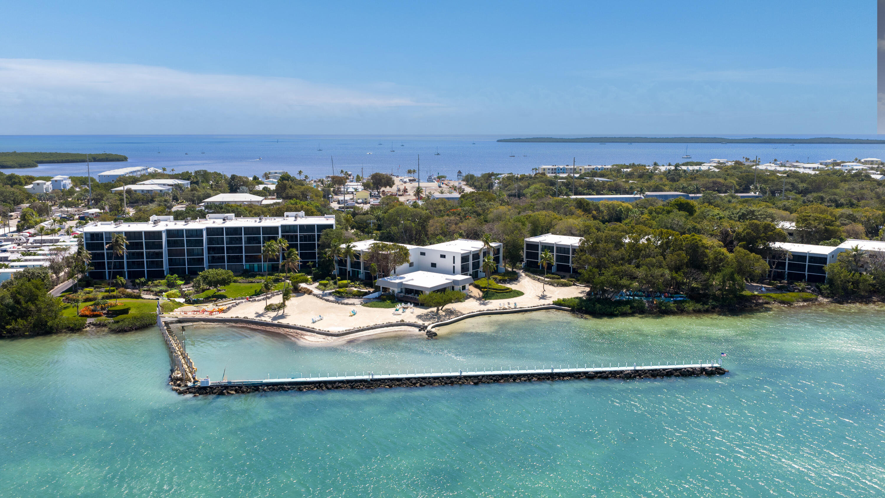 97652 Overseas Highway, Unit M4 Key Largo, FL 33037 - Photo 3 of 44 an outdoor sitting area with furniture and city view