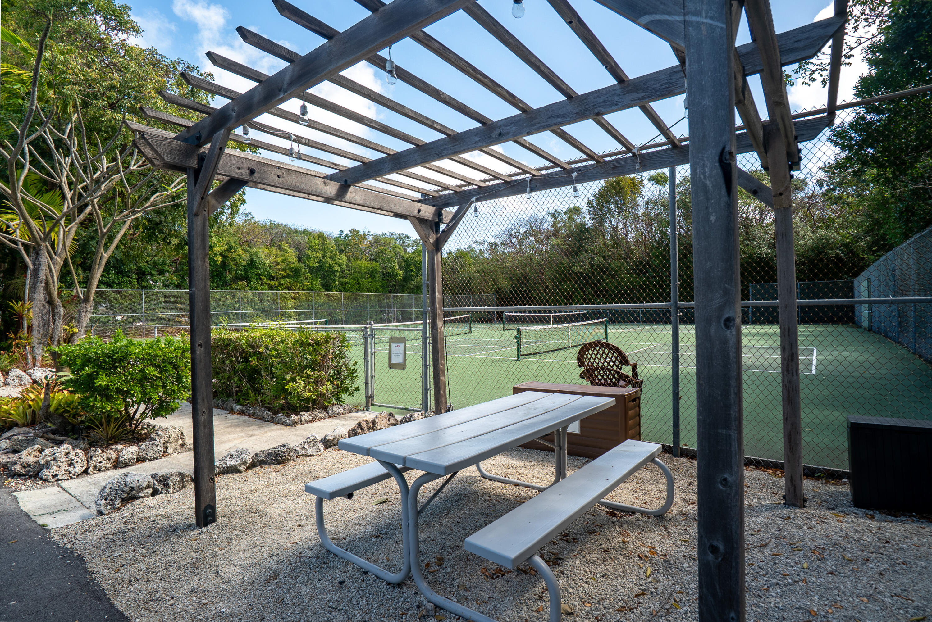 97652 Overseas Highway, Unit M4 Key Largo, FL 33037 - Photo 37 of 44 Picnic & Tennis area