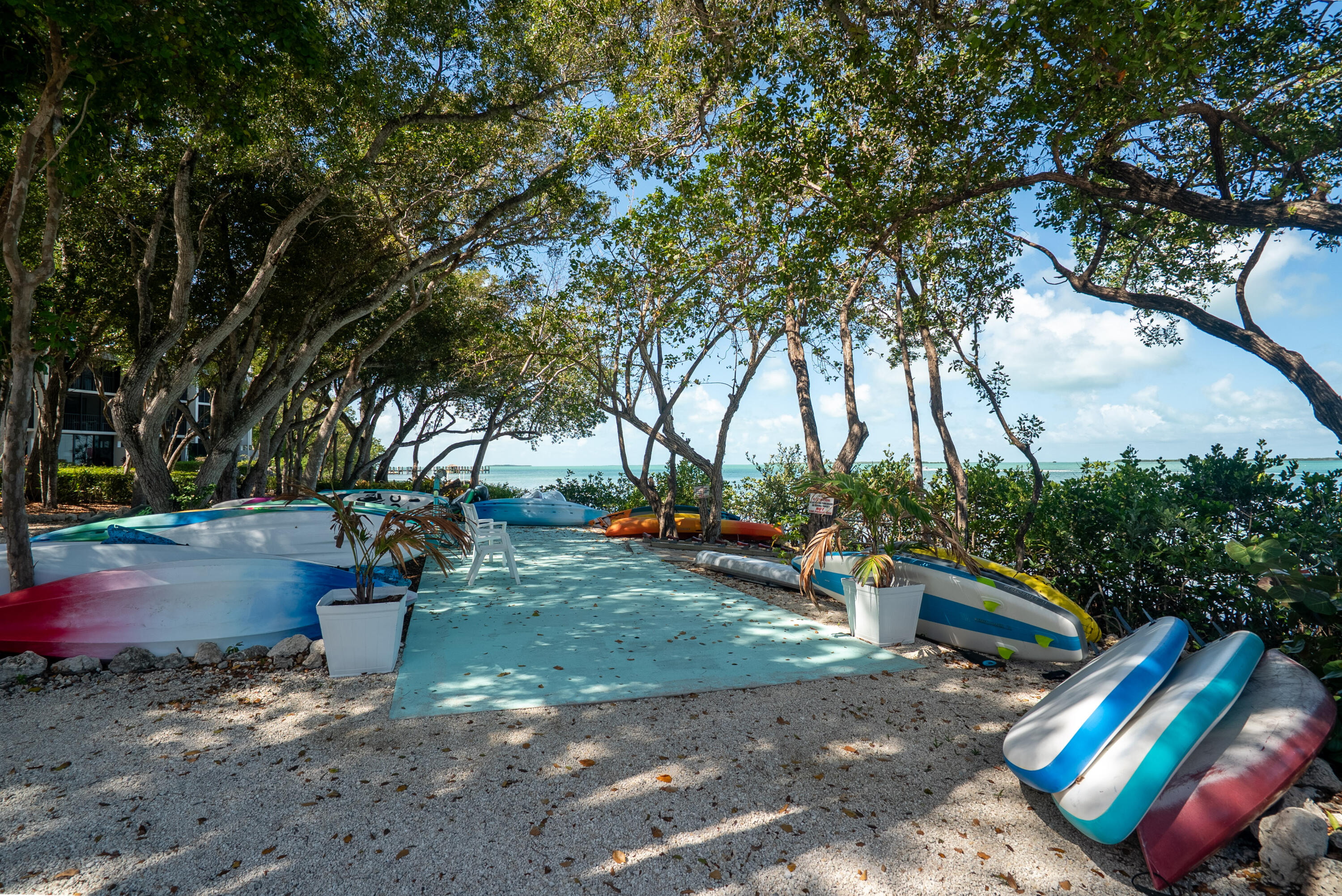 97652 Overseas Highway, Unit M4 Key Largo, FL 33037 - Photo 39 of 44 a view of a park with large trees