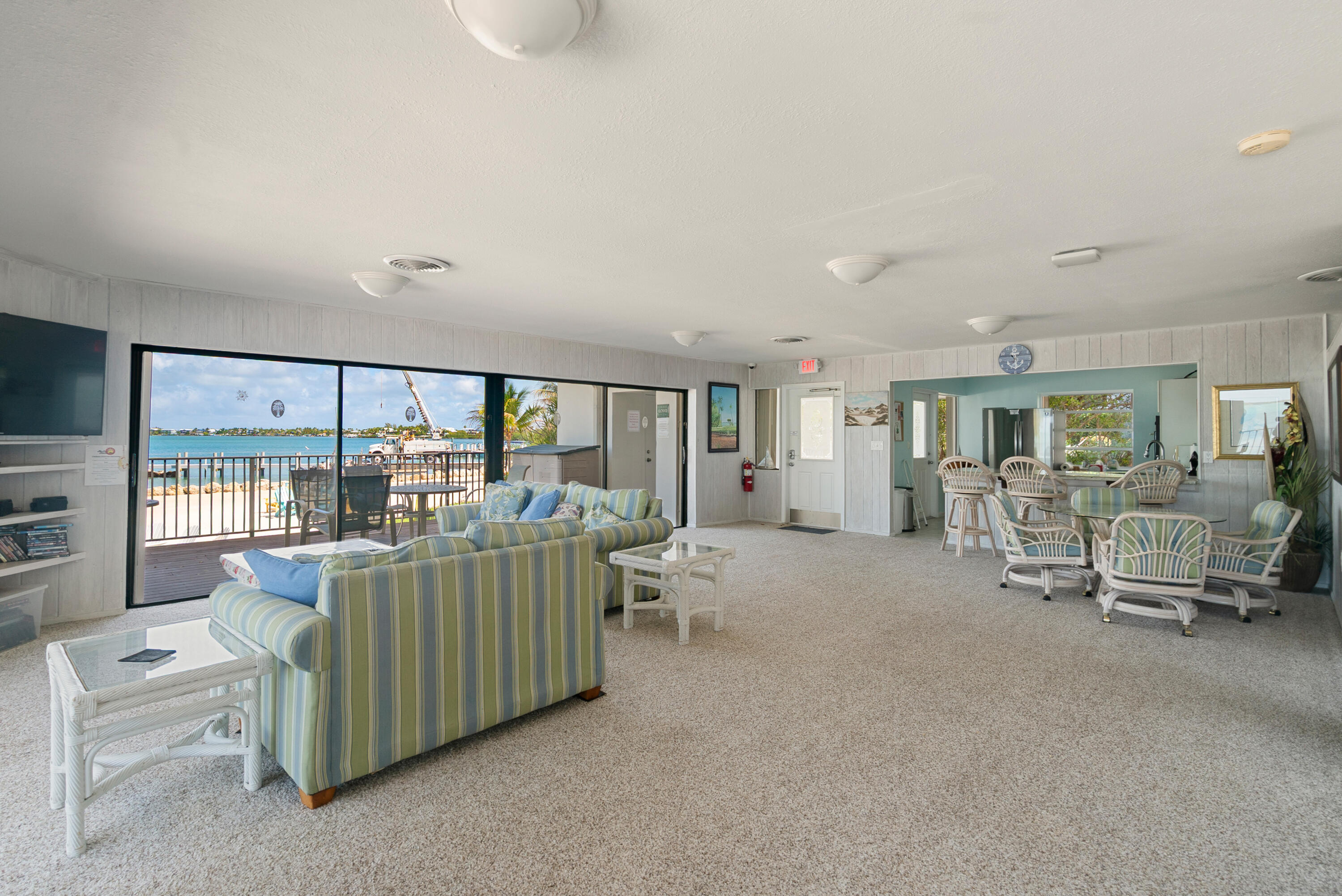 97652 Overseas Highway, Unit M4 Key Largo, FL 33037 - Photo 42 of 44 a living room with furniture and a large window