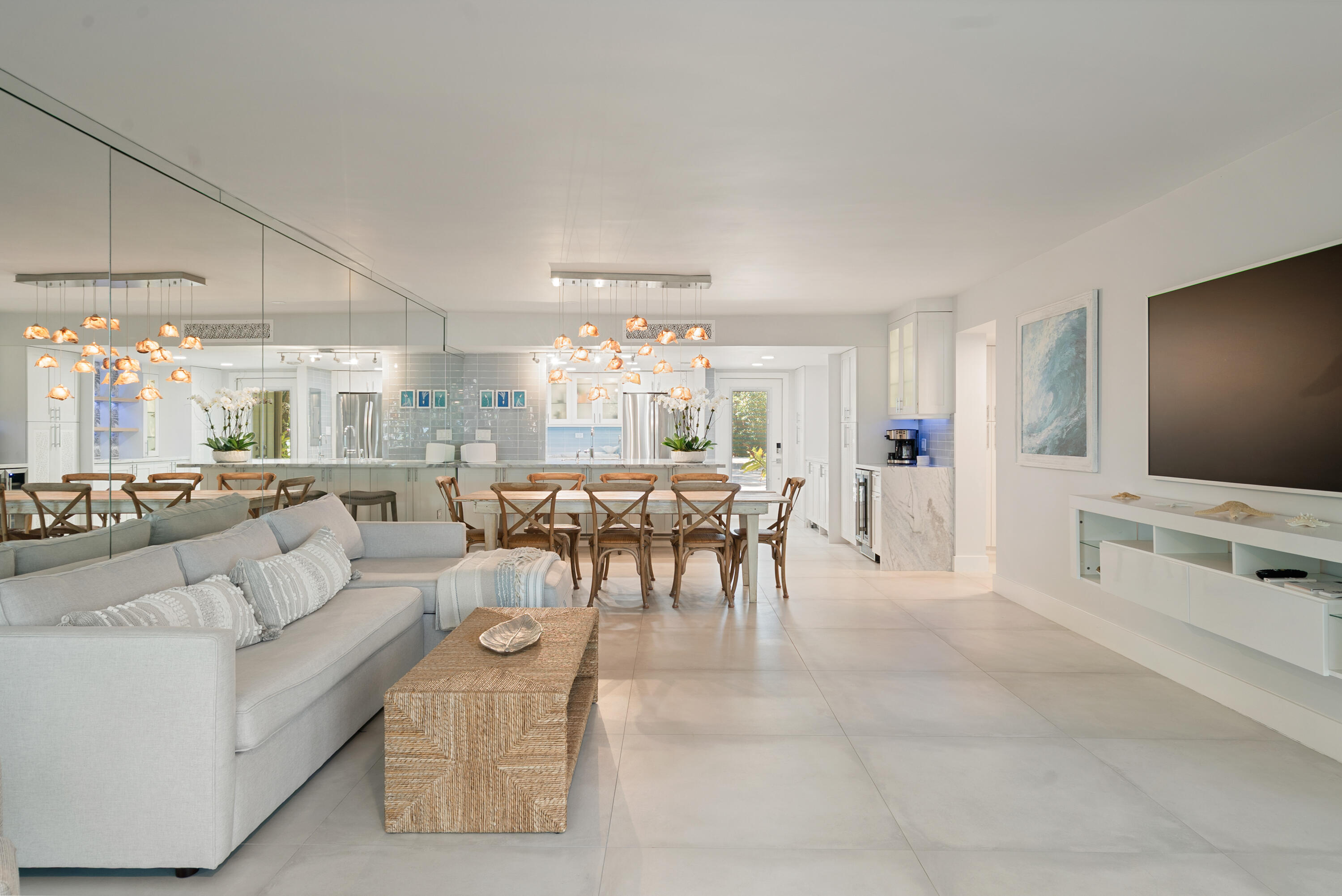 97652 Overseas Highway, Unit M4 Key Largo, FL 33037 - Photo 8 of 44 a living room with furniture and a flat screen tv