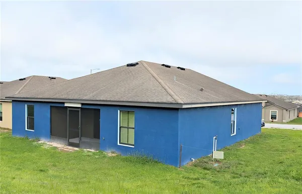 a house with yard in front of it
