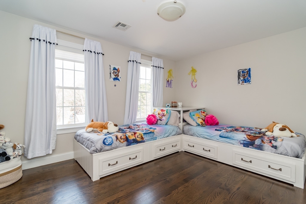 6 Hickory Road Natick, MA 01760 - Photo 18 of 35 a bedroom with furniture and a wooden floor