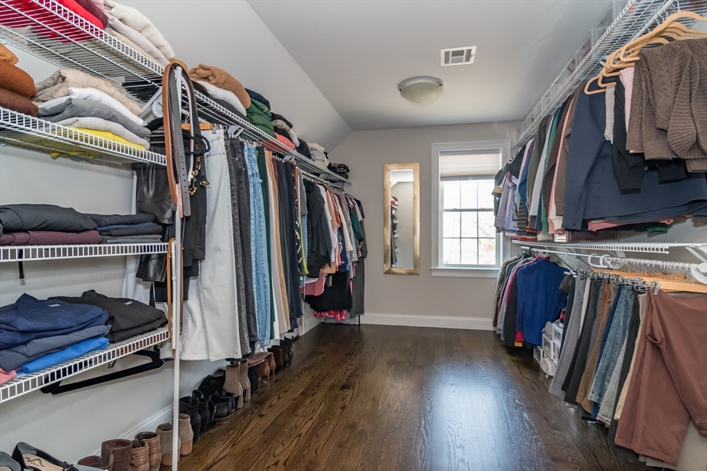 6 Hickory Road Natick, MA 01760 - Photo 22 of 35 a view of walk in closet with clothes and shoes