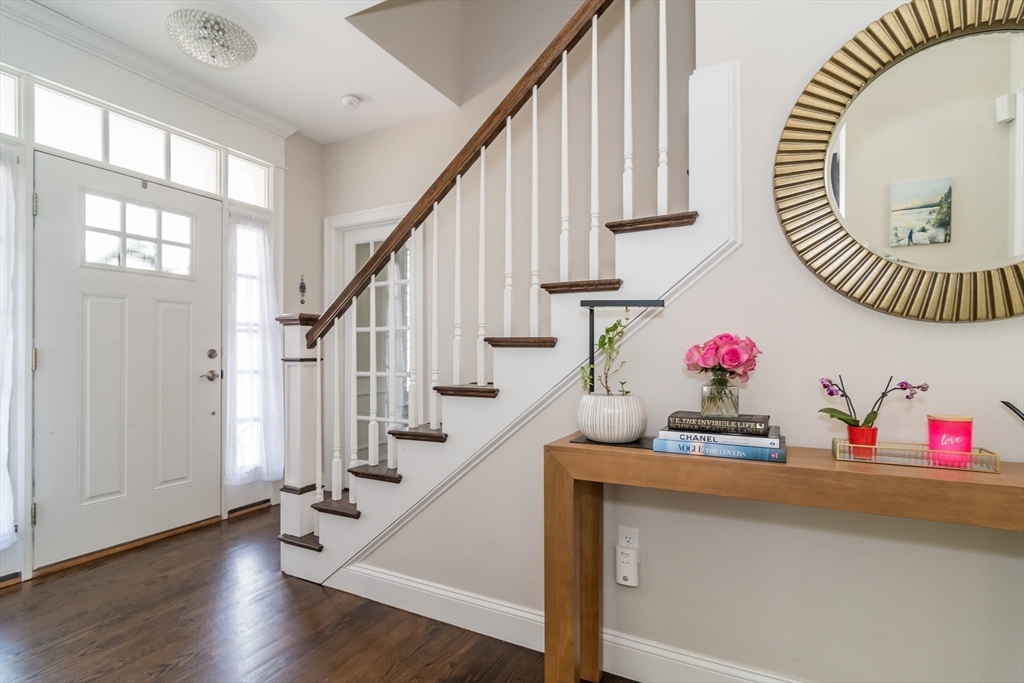 6 Hickory Road Natick, MA 01760 - Photo 5 of 35 a view of entryway with wooden floor and stairs