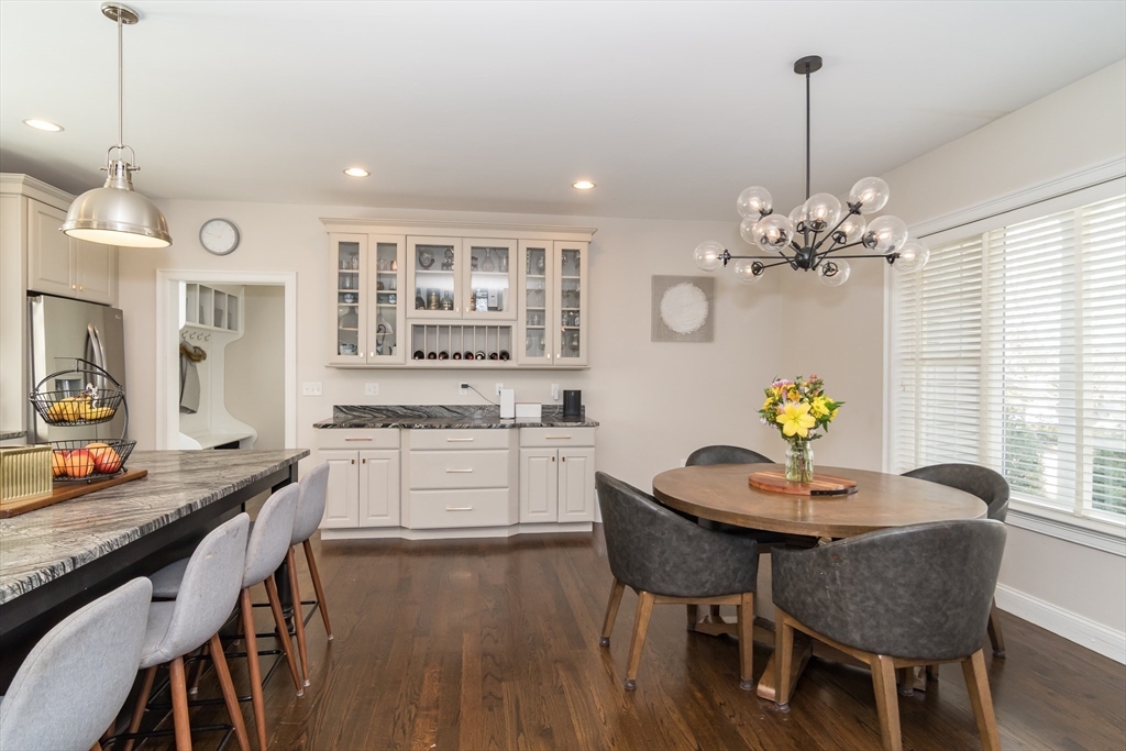 6 Hickory Road Natick, MA 01760 - Photo 9 of 35 a dining room filled chandelier and wooden floor